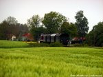 112 703 (203 230) unterwegs nach Bergen auf Rgen bei der vorbeifahrt am Putbusser Ortsteil Pastitz am 21.5.16