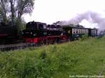 RBB 99 4802 unterwegs nach Ostseebad Ghren bei der Ausfahrt aus Putbus am 29.5.13