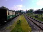 RBB 99 4011 mit 251 901 als Schlusslicht und Schublok unterwegs nach Lauterbach Mole bei der Ausfahrt aus Putbus am 29.5.13