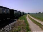 RBB 99 4011 unterwegs nach Putbus beim Verlassen des Haltepunkts Seelvitz am 30.5.13