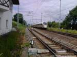 BR 411 mit dem Namen  Freie- & Hansestadt Hamburg  unterwegs nach Warnemnde bei der Durchfahrt am S-Bahn Hp Rostock-Bramow am 22.6.13