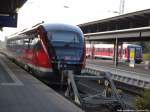 642 053/553 als RB123 mit ziel Graal-Mritz im Bahnhof Rostock Hbf whrend dessen der 628er ins BW Fhrt am 31.8.13