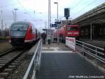 BR 642 als RE8 mit Ziel Tessin & 112 185 als OE RE2 (DB REGIO im Auftrag der ODEG) mit Ziel Cottbus im Bahnhof Wismar am 13.4.13