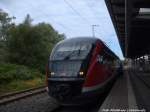 642 054 / 554 als RE8 mit ziel Tessin im Bahnhof Rostock Hbf am 13.7.14