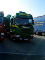 LKW SZM SCNIA G 420 mit Kofferauflieger der Spedition Offergeld auf dem Autohof in Grnstadt am 24.09.2013