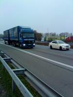 LKW Mercedes-Benz 2541 Gliederzug mit Pritsche-Planen-Aufbau auf der A 61 beim Rasthof Dannstadt am 19.11.2013