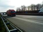 SZM Mercedes-Benz Actros mit Pritsche-Planen-Auflieger gesehen auf der A 61 Hhe Rasthof Dannstadt am 18.02.2014