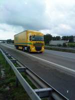 SZM DAF XF mit Pritsche-Planen-Auflieger der M.A.F geshen auf der A 61 Nhe Raststtte Dannstadt am 14.07.2014