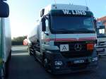 LKW SZM Mercedes-Benz Actros 1846 mit Tankauflieger auf dem Autohof in Grnstadt am 31.10.2013