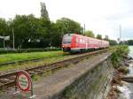 612 075 verlsst am 12.07.2012 den Bodenseedamm in Lindau.