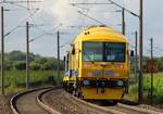 Nachschuss auf den DBV 92455 Linsinger Schienenfräszug der hier den Bü Jübek-Nord passiert hat und Richtung Padborg fährt. 14.08.2013