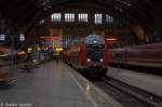 RB54 (RB 26112/RB 17871) von Leipzig Hbf nach Lutherstadt Wittenberg über Dessau im weihnachtlichen Leipziger Hbf und geschoben hatte die 143 034-7.