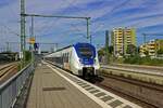 9442 368 und ein weiterer Triebzug verlassen auf der Fahrt von Wuppertal nach Kln den Bahnhof von Opladen.