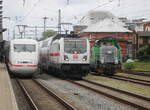 ICE1, IC2 Doppelstock und 650 107-2 am 06.08.2023 im Rostocker Hbf.