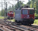 Schweitz trifft West-V100 im Bahnhof Hamburg-Harburg.(04.06.2011)