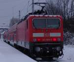 143 860-5 mit S1 von Warnemnde Richtung Rostock Hbf kurz nach der Ankunft im Bahnhof Rostock-Bramow.(05.12.10)