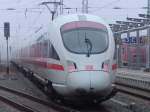 ICE1611 von Warnemnde Richtung Mnchen Hbf bei der Ausfahrt im Rostocker Hbf.(19.03.2011)