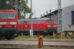 Verstecken wollte sich 218 315-0 hinter 143 250-9 aber nix da der Fotograf hat sie erwischt als Sie im BW Rostock Hbf/Dalwitzhof abgestellt war.(16.05.2011)