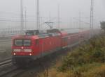 RE 92965 von Trebbin nach Rostock Hbf bei der Einfahrt um 09:23 Uhr im Rostocker Hbf.29.10.2011