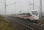 411 059-9  Passau  als ICE 1611 Warnemnde-Mnchen bei der Ausfahrt im Rostocker Hbf.29.10.2011