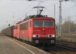 155 126-6+140 024-1 mit Gterzug von Rostock-Seehafen nach Maschen bei der Ausfahrt in Rostock-Dierkow.08.11.2011