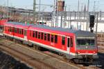 928 647 als RE6 Rostock-Lbeck(Leerzug)bei der Ausfahrt im Rostocker Hbf.26.02.2012