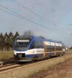 OLA-VT 0009 als OLA79758 von Gstrow nach Rostock Hbf kurz vor der Einfahrt im Rostocker Hbf.04.03.2012