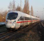 411 026-8(ICE-T Leipzig)als ICE 1609 von Warnemnde nach Mnchen Hbf musste wegen Hp0 im S-Bahnhof Rostock-Holbeinplatz langsam fahren.23.03.2012