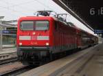 statt 120.2 fuhr am 14.07.2012 112 115-1 den RE 4314 von Rostock Hbf nach Hamburg Hbf kurz vor der Ausfahrt im Rostocker Hbf.