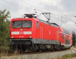 112 104-5 mit RE 93306 von Rostock-Kassebohm nach Hamburg Hbf bei der Durchfart in der Gterumgehung in Hhe Rostock Hbf.01.09.2012