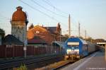 253 015-8 PRESS (223 052-2) mit einem vollen Hackschnitzelzug in Rathenow Richtung Stendal unterwegs.