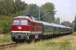 232 356-6 mit dem WFL SDZ von Warnemünde nach Rostock Hbf bei der Durchfahrt in Rostock-Lichtenhagen.12.08.2023