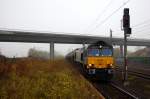 DE 6302 (266 034-8) im Dienst fr Crossrail mit einem Kesselzug in Wustermark.