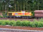 Eine MaK 1206 der Eisenbahn und Hfen ist am 23.07.2010 mit einem Gterzug in Dortmund-Marten-Sd unterwegs.