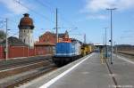 202 330-7 NBE RAIL GmbH, zur Zeit an die HGB - Hessische Gterbahn GmbH vermietet als Ersatz fr V100.01, mit Bauzug in Rathenow in Richtung Stendal unterwegs.