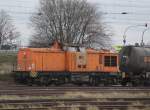 WFL 293 021-2 mit Kesselzug von Stendell auf dem Weg zum lhafen Rostock-Seehafen bei der Duchfahrt im Bahnhof Rostock-Seehafem.30.12.2012