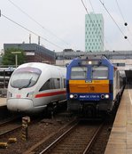 Bauformen wie sie unterschiedlicher nicht sein können...der windschnittige ICE-T  Erfurt  411 006/504 steht gemeinsam mit der MaK Schrankwand DE 2700-10/251 010-5/Di6 der NOB im Bahnhof