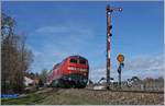 Die DB 218 409-1 ist mit ihrem RE nach Lindau bei Nonnenhorn auf dem Weg nach Lindau.