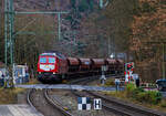 Die „Ludmilla“ 233 527-2 (92 80 1233 527-2 D-WFL) der WFL - Wedler Franz Logistik GmbH & Co. KG (Potsdam) fährt am 03.12.2021 mit einem Schotterzug durch den Bahnhof Kirchen/Sieg in Richtung Siegen.

Die Ludmilla bzw. V 300 wurde 1977 von LTS (Luhanskyj Teplowosobudiwnyj Sawod , auch bekannt als Lokomotivfabrik Lugansk (ehemals Woroschilowgrad) unter der Fabriknummer 0762 gebaut und als DR 132 527-3 an die Deutsche Reichsbahn (DR) geliefert. Zum 01.01.1992 erfolgte die Umzeichnung in DR 233 527-2 und zum 01.01.1994 dann in DB 233 527-2. Im Jahre 2015 wurde sie bei der DB Cargo ausgemustert und 2018 an die WFL verkauft.

Die Lokomotiven dieser Baureihe sind für den mittleren und schweren Streckendienst geeignet. Die Leistung vom wird von einem Kolomna 5D49 direkteinspritzenden 16-Zylinder-Viertakt-Dieselmotor mit Abgasturbolader und Ladeluftkühlung, 4 Ventile pro Zylinder, sowie mit Zylindergruppenabschaltung vom bereitgestellt. Die Höchstgeschwindigkeit beträgt 120 km/h. 

Weitere TECHNISCHE DATEN der BR 234:
Hersteller: Lokomotivfabrik „Oktoberrevolution“Lugansk
Spurweite: 1435 mm (Normalspur)
Achsformel: Co’Co’
Länge über Puffer: 20.820 mm
Drehzapfenabstand: 11.980 mm
Achsstand im Drehgestell: 2 x 1.850 mm (3.700 mm)
Breite des Lokkastens: 2.950 mm
Höhe über Schienenoberkannte: 4.590 über SOK
Dienstgewicht: 124 t
Radsatzfahrmasse: 20,6 t
Anfahrzugkraft: 294 kN
Dauerzugkraft: 194 kN
Höchstgeschwindigkeit: 120 km/h
Treibraddurchmesser: 1.050 mm (neu) / 952 mm (abgefahren)

Motorart: direkteinspritzenden V-16-Zylinder-Viertakt-Dieselmotor mit Abgasturbolader und Ladeluftkühlung, 4 Ventile pro Zylinder, mit Zylindergruppenabschaltung
Motorentyp: Kolomna 5D49
Motorhubraum: 220,9 l
Ladeluftdruck: 1,3 bar
Einspritzbeginndruck: 320 bar
Max. Verbrennungsdruck: 115 bar
Motorleistung: 2.230 kW (3.000 PS)

Leistungsübertragung: elektrisch
Traktionsgeneratortyp: GS-501A
Traktionsgeneratorleistung: 2.190kW
Traktionsleistung: 1.830 kW (6 x 305 kW)
Anzahl der Fahrmotoren: 6 vom Typ ED 118
Tankinhalt: max. 6.000 l (Grenzwertüberwacht bei 5.400 l)
Bremse: KE-GPR + E mZ