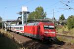 Deutsche Bahn muss sparen:101 052-9 mit dem 4xWagen IC 2239 von Warnemnde nach Leipzig Messe bei der Duchfahrt im Haltepunkt Rostock-Marienehe.25.09.2015