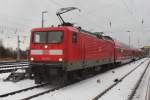 112 122-7 stand am 08.01.2016 mit dem RE1(Hanse-Express)im Rostocker Hbf.