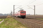 Die Ex Braunschweigerin 112 128 mit dem RE1 (RE 18187) von Brandenburg Hbf nach Frankfurt(Oder) bei Brandenburg.