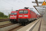 112 105 mit RE 1 Park beim Rangieren im Rostocker Hbf.27.08.2016