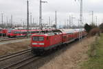 112 188-8 mit RE5 von Rostock Hbf nach Wünsdorf-Waldstadt bei der Ausfahrt im Rostocker Hbf.11.03.2017