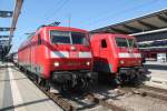 120 113-6 mit IC 2409(Warnemnde-Dsseldorf)bei der Ausfahrt im Rostocker Hbf.neben an stand 120 203-5+RE 4312(Rostock-Hamburg)19.04.2015