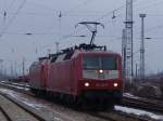 120 142-5+145 033-7 bei der Ausfahrt aus dem Kombiwerk Rostock-Seehafen Aufgenommen am 18.03.06 in Hhe Rostock-Toitenwinkel