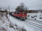 140 013 mit dem Leerzug Mukran-Mhlheim am 15.Dezember 2010 in der Kurve bei Bergen/Rgen.