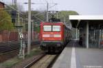 112 102-9 mit dem RE2 (RE 37385) nach Knigs Wusterhausen in Rathenow.