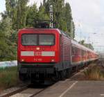 112 190 mit Sonderzug Nummer 2 von Warnemnde nach Berlin-Zoologischer Garten bei der Durchfahrt im S-Bahnhof Rostock-Holbeinplatz.11.08.2013