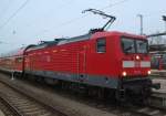 Die Rostocker 112 114-4 stand am 30.11.2014 mit ihrem RE5 von Rostock Hbf nach Lutherstadt Wittenberg im Rostocker Hbf.